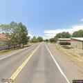 Tan RV door creates traffic hazard on Highway 285