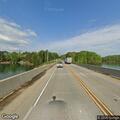 Deer blocking roadway near Sixmile Creek Bridge