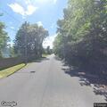 Raccoon reported in road on Sunrise Road off-ramp