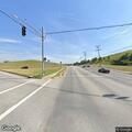 Man found unconscious slumped over in vehicle on road