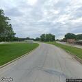 Vehicle leaves roadway near admin building
