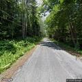 Truck reportedly releasing fumes on Old Twistback Rd