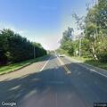 Officer with disabled vehicle on Montauk Highway