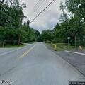 Minor crash between car and bicyclist on Drake Road