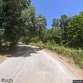 Road hazard from trucks on Poor Farm Road