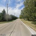 Vehicle hits power pole, wires down in Wonder Lake