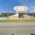 Person experiencing headache at Ball Shelter Stadium