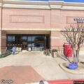 Homeless man sleeping outside Kroger store
