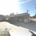 Person reported standing outside convenience store