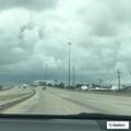 Reckless green pickup reported on I-10 westbound