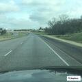 Traffic stop on beige Dodge Ram on US-290