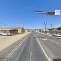 18-wheeler drives off roadway near intersection