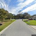 Person experiencing abdominal pain in Jacksonville