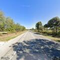 Broken down truck blocking lane at FM 1209 and FM 969
