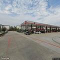 Diesel fuel spill at gas station parking lot