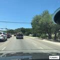 Traffic stop on white GMC Yukon in West Lake Hills