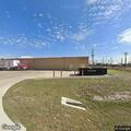 Officer checks vehicle at Harper Family Dollar