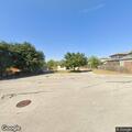 Caller reports possible intruder fleeing garage