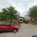 Loose pit bulls reported attacking another dog