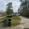 Person with hand cut after assault at home