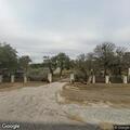 Officers check open doors on Pace Bend Road