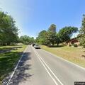 Car hits brick mailbox and blocks roadway