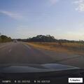 Truck dragging loose gate creating sparks on highway