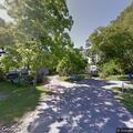 Person experiencing back pain near Seaman Avenue