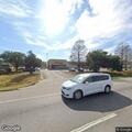 Person lying in Walgreens parking lot