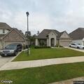 Strong natural gas odor between homes in Covington