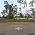 Person unconscious on highway near Alpha Boulevard