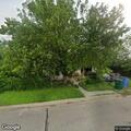 Noise and possible fight near parked sedan