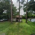 Tree damages home and downed power lines on Elm Street