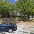 Vehicle hits parked car; driver reports chest pain