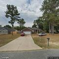 Fence and plants on fire at Loblolly Circle