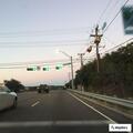 Disabled SUV causing traffic hazard at intersection