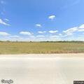 Vehicle in grass median on SH 130 near Hutto
