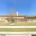 Person reporting back pain in Round Rock home