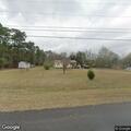Grass fire in vacant lot on Eldridge Court