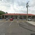 Woman falls down steps, hip displaced at motel