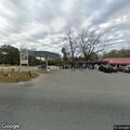 Two-vehicle crash with minor injuries at country store