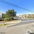 Vehicle and bicycle crash at apartment entrance
