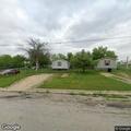 Officers check two men outside home on East Pecan