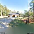 Backyard timber fire near house in Thomasville
