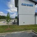 Report of sparking power pole near car wash