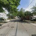 Person down and not breathing on sidewalk in Floral Park