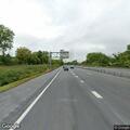Person reported hanging from bridge near I-690/I-695 ramp, later seen walking southbound