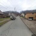 Person returns outside house on South Frank Street