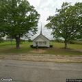 Man experiencing dizziness outside church on Highway 21
