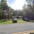 Living room smoke alarm at Dover Bluff Road home